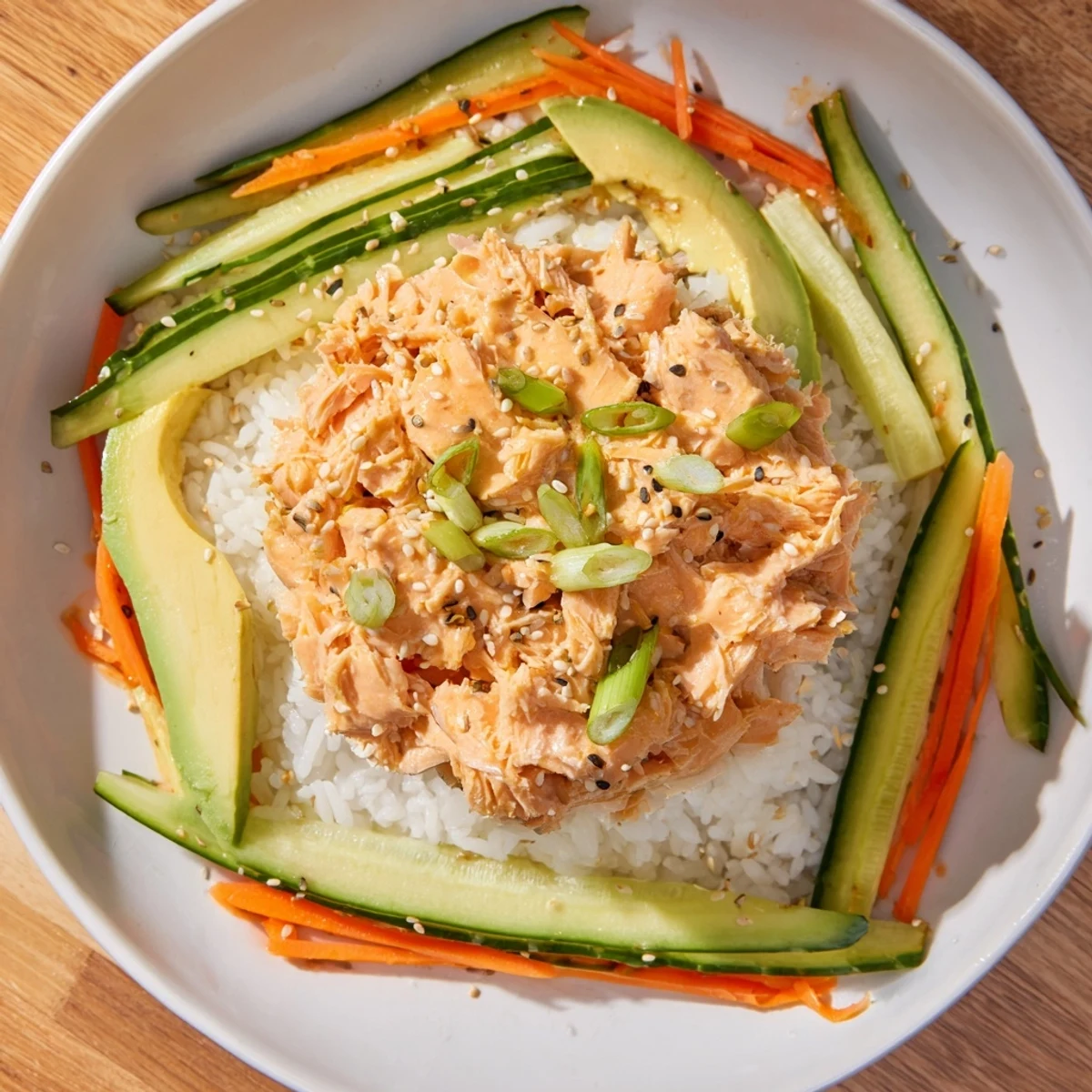 Quick and easy Spicy Canned Salmon Rice Bowl with colorful vegetables, perfect for a weeknight dinner.