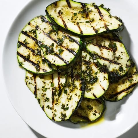 Vibrant image of grilled Garlic Herb Zucchini ready to serve, a Mediterranean-inspired side dish.