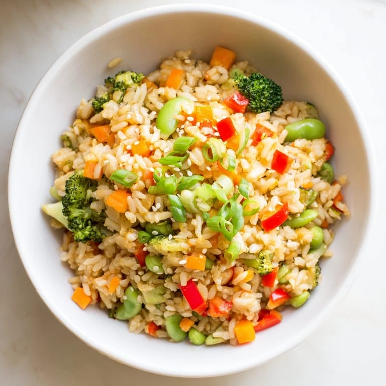 A visually stunning photo of crispy Vegetable Fried Rice Bowls, boasting a delightful mix of textures and flavors.