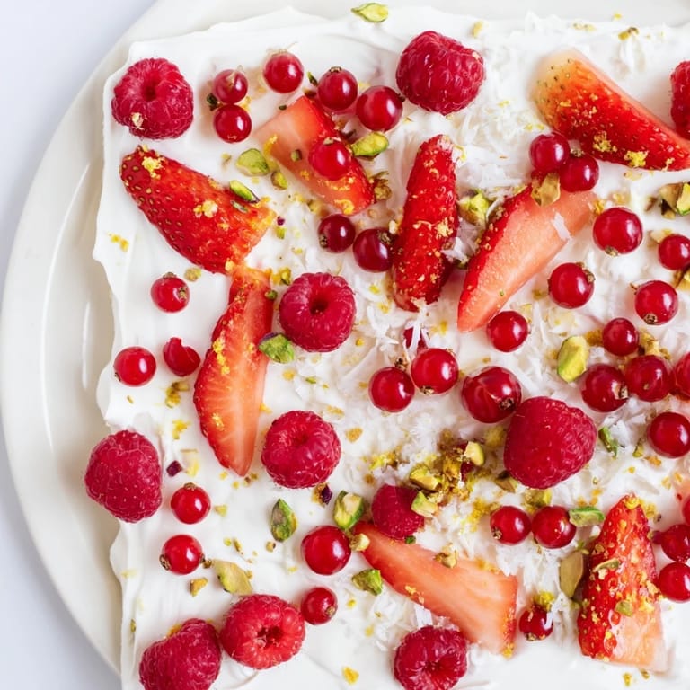 A close-up of delicious frozen yogurt bark with mixed berries, perfect dessert.