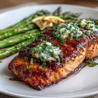 Garlic Butter Salmon with Asparagus, roasted to perfection with lemon and garlic, creates a stunning and healthy main dish.